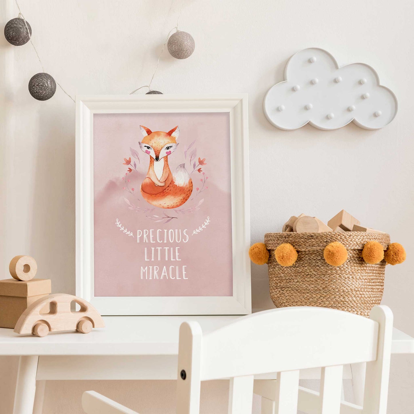 An white frame of a cute woodland fox with inspirational quote decorated in a living room