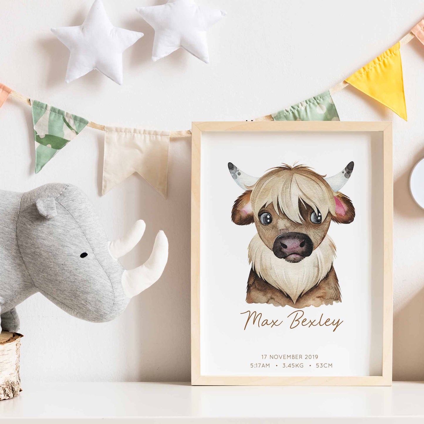 Framed picture of a watercolour yak kids personalised birth print in a child's nursery