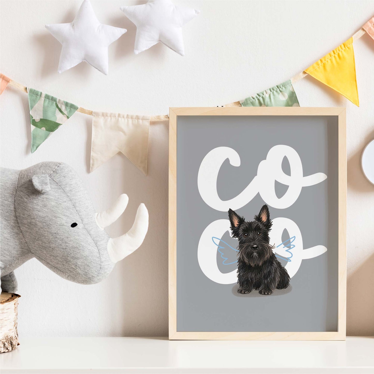 Framed kids pet portrait  with a dog illustration and 'Coco' text in a child's room setting.