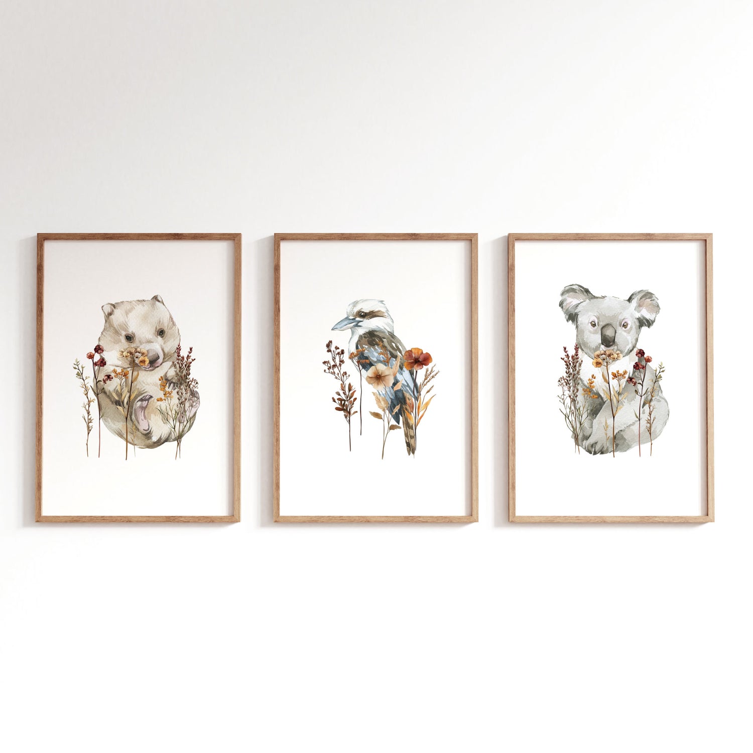 Australian native animals nursery prints set of three featuring koala kookaburra and wombat with dried botanicals