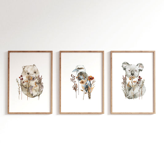 Australian native animals nursery prints set of three featuring koala kookaburra and wombat with dried botanicals