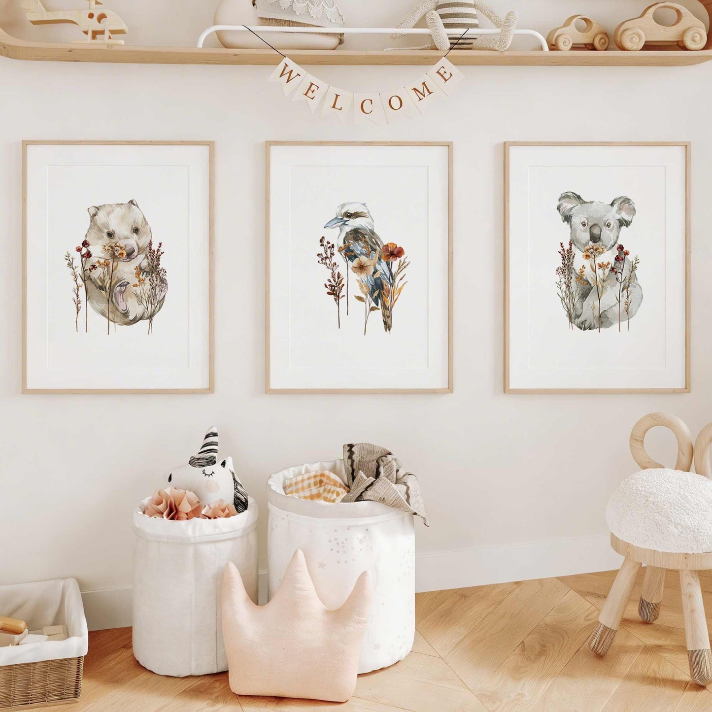 Australian nursery wall art styled in a kids playroom featuring koala wombat and kookaburra prints