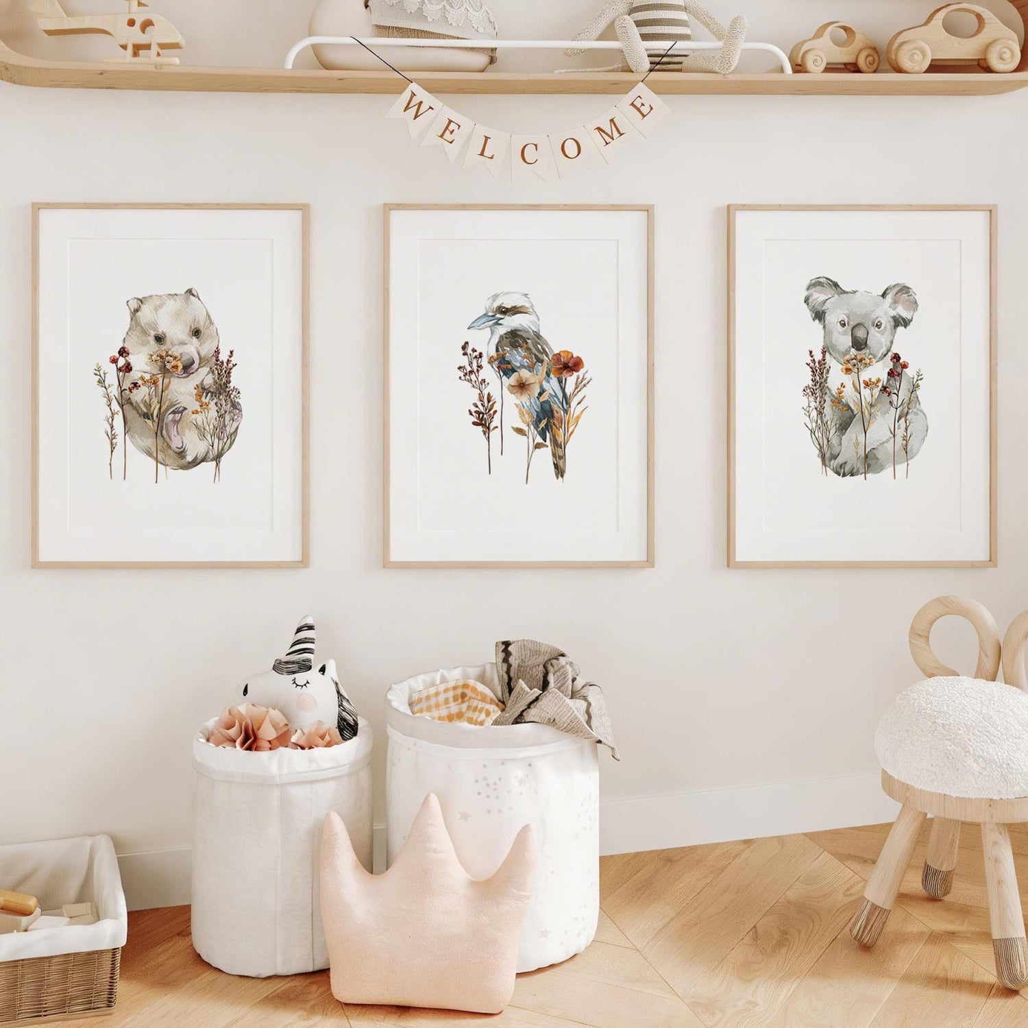 Australian nursery wall art styled in a kids playroom featuring koala wombat and kookaburra prints