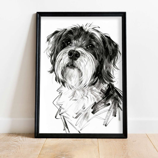 Single sketch style dog portrait in black frame leaning against wall