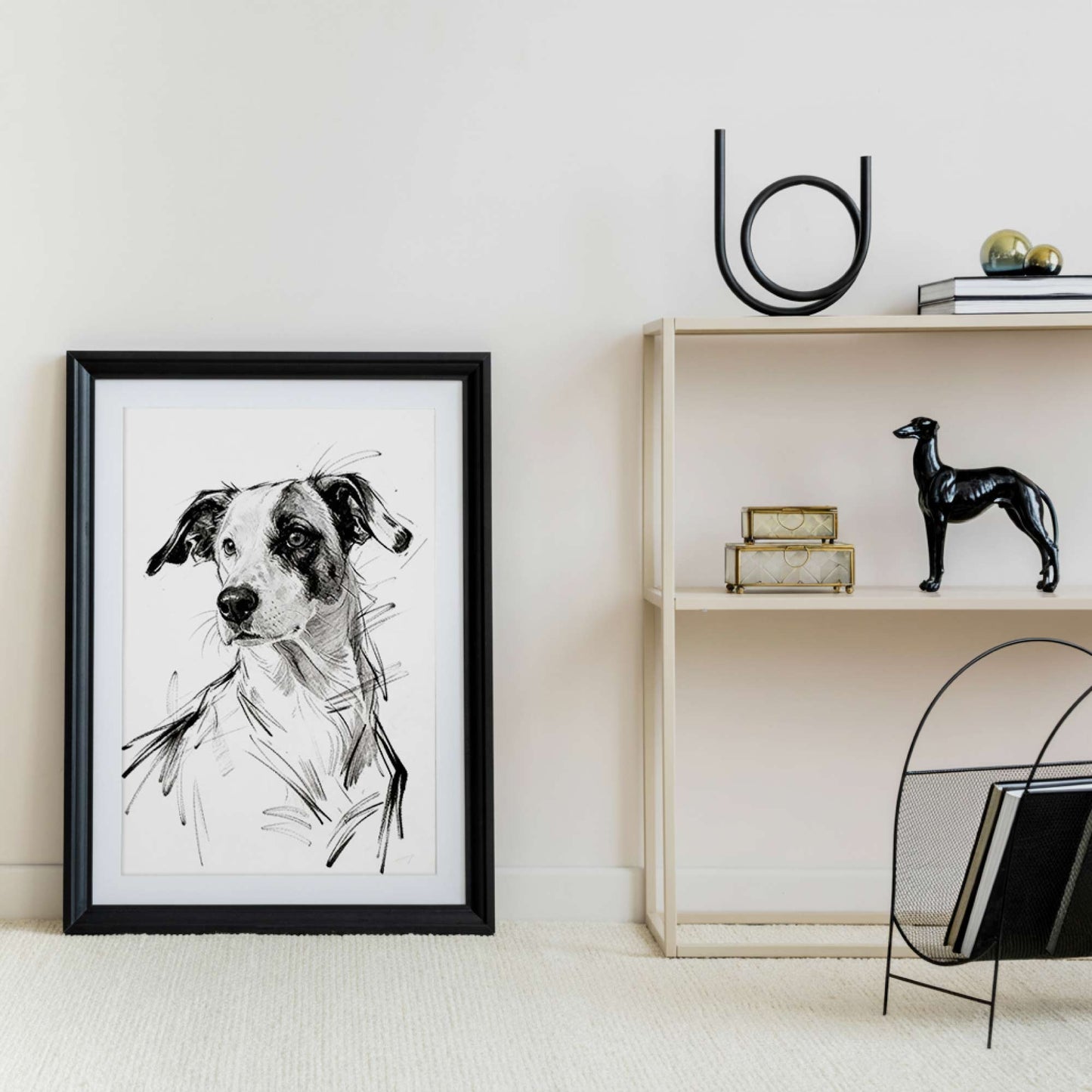 Framed sketch style dog portrait styled on shelf with decor