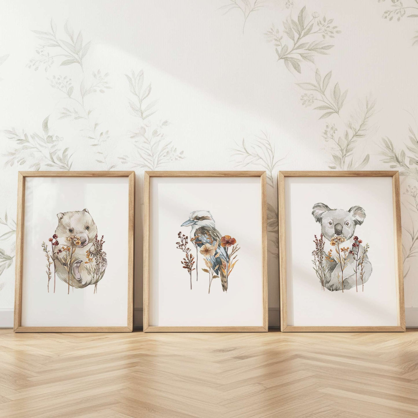 Australian nursery wall art styled in a neutral kids room featuring koala wombat and kookaburra prints