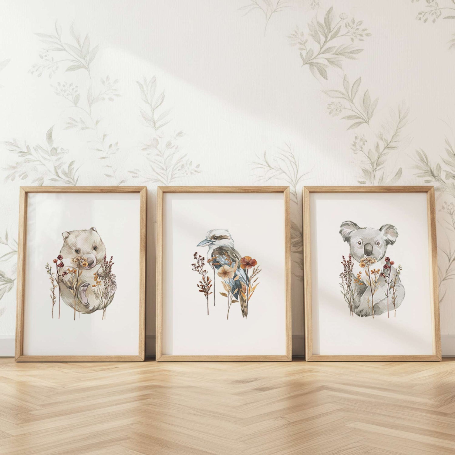 Australian nursery wall art styled in a neutral kids room featuring koala wombat and kookaburra prints