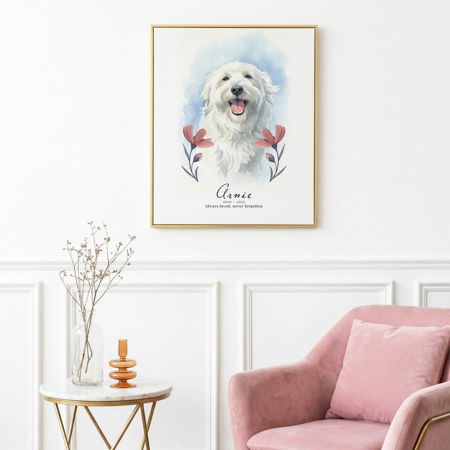 Framed artwork of a white dog with flowers on a wall above a pink armchair.