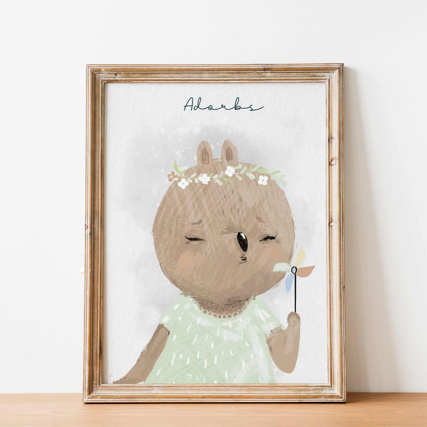 An oak frame of a cute whimsical bear with inspirational quote