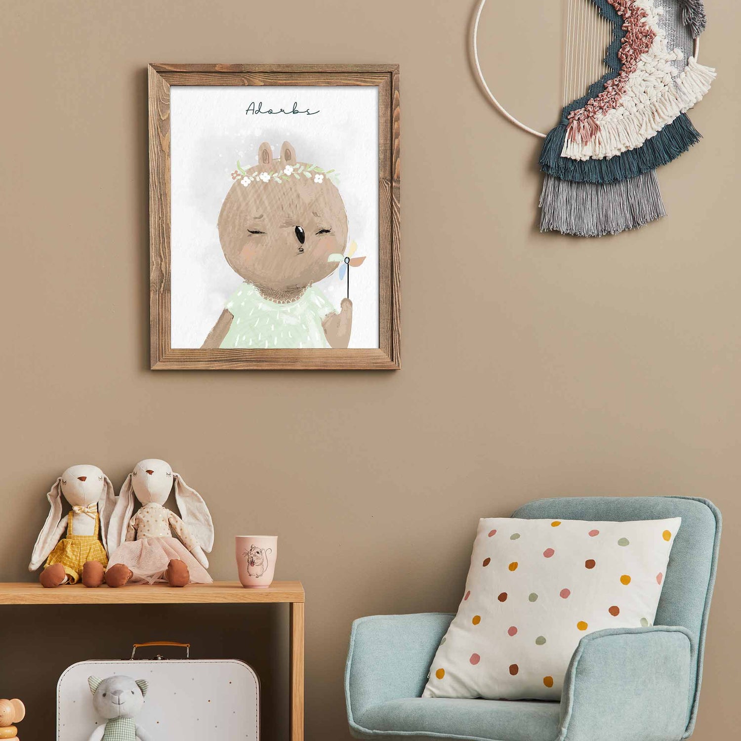 An oak frame of a cute whimsical bear with inspirational quote decorated in a kids room