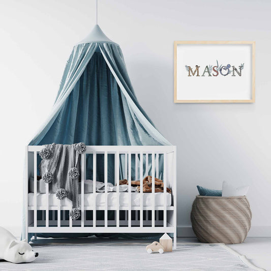 An oak picture frame of a animal alphabet shape name print with foliages decorated in a nursery