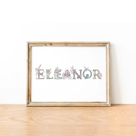 An oak picture frame of a animal alphabet shape name print with foliages