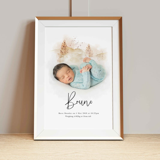 A picture frame of a personalised baby portrait print