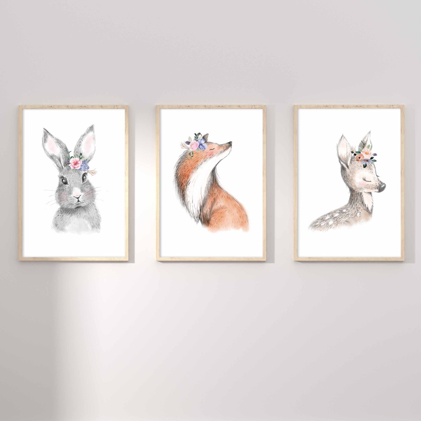 A set of 3 framed images of woodland bunny rabbit, fox and deer floral nursery kids print