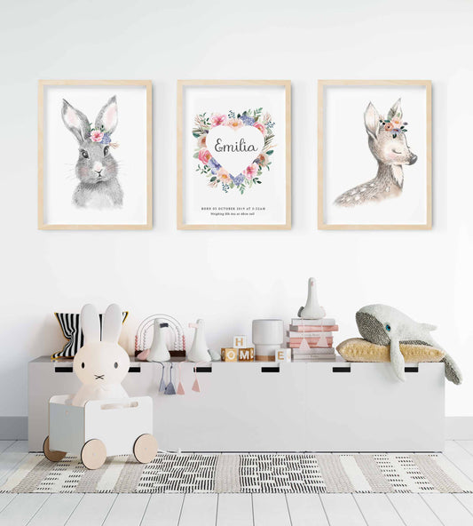 A set of 3 framed images of woodland bunny rabbit and deer floral heart wreath nursery personalised birth print decorated in a nursery