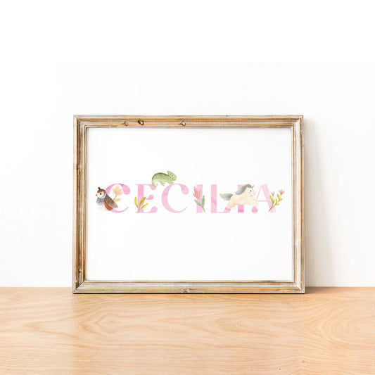 An oak picture frame of a cute animals kids personalised name print in pink watercolour