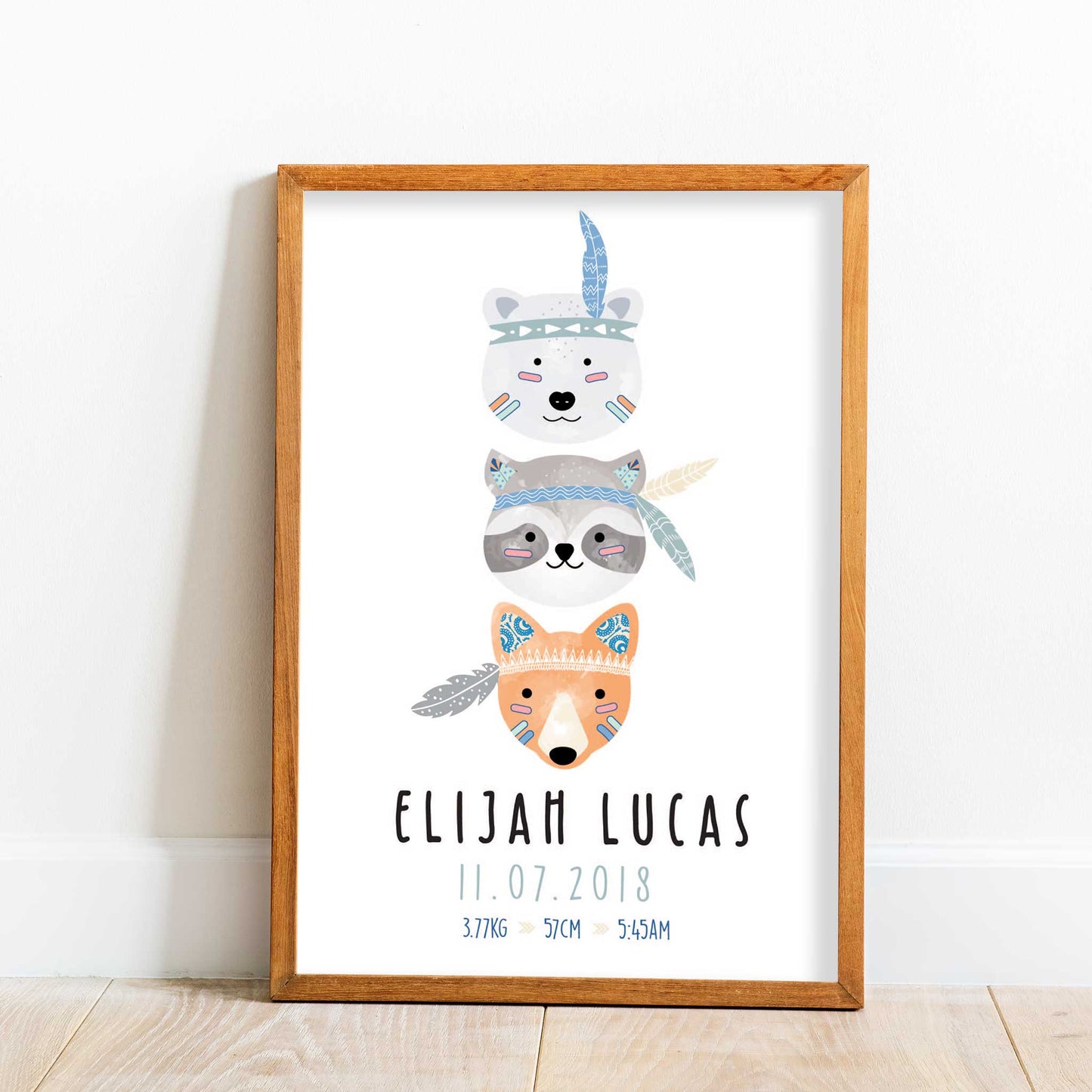 A wooden picture frame of tribal animals kids personalised nursery birth print