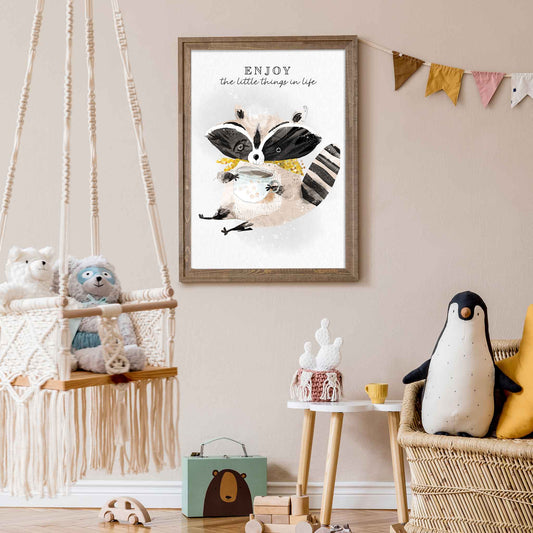 An oak frame of a cute whimsical raccoon with inspirational quote decorated in a kids room