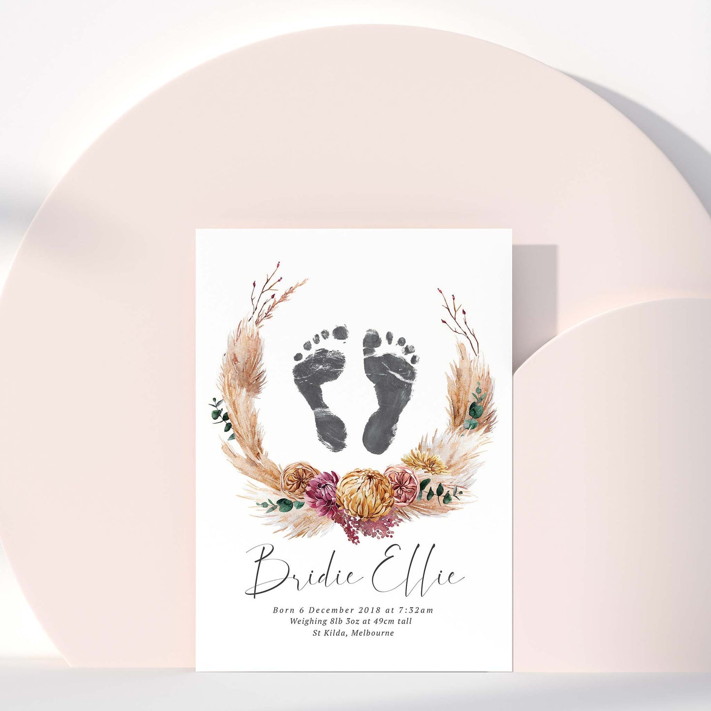 A picture of a floral boho baby personalised keepsake footprints birth print