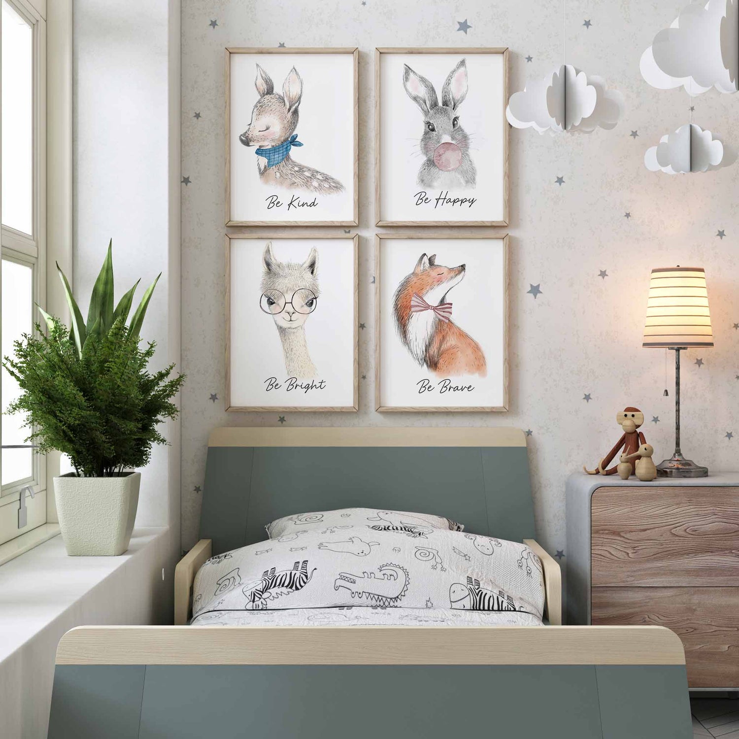 A set of 3 framed images of cute and quirky woodland deer, bunny rabbit, llama and fox nursery kids prints decorated in a kids room