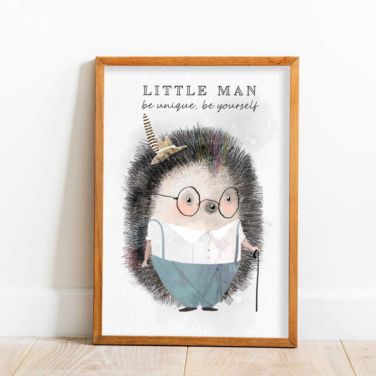 An oak frame of a cute whimsical hedgehog with inspirational quote