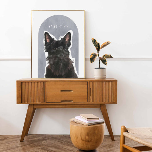 A gold frame of a custom dog portrait decorated in a living room