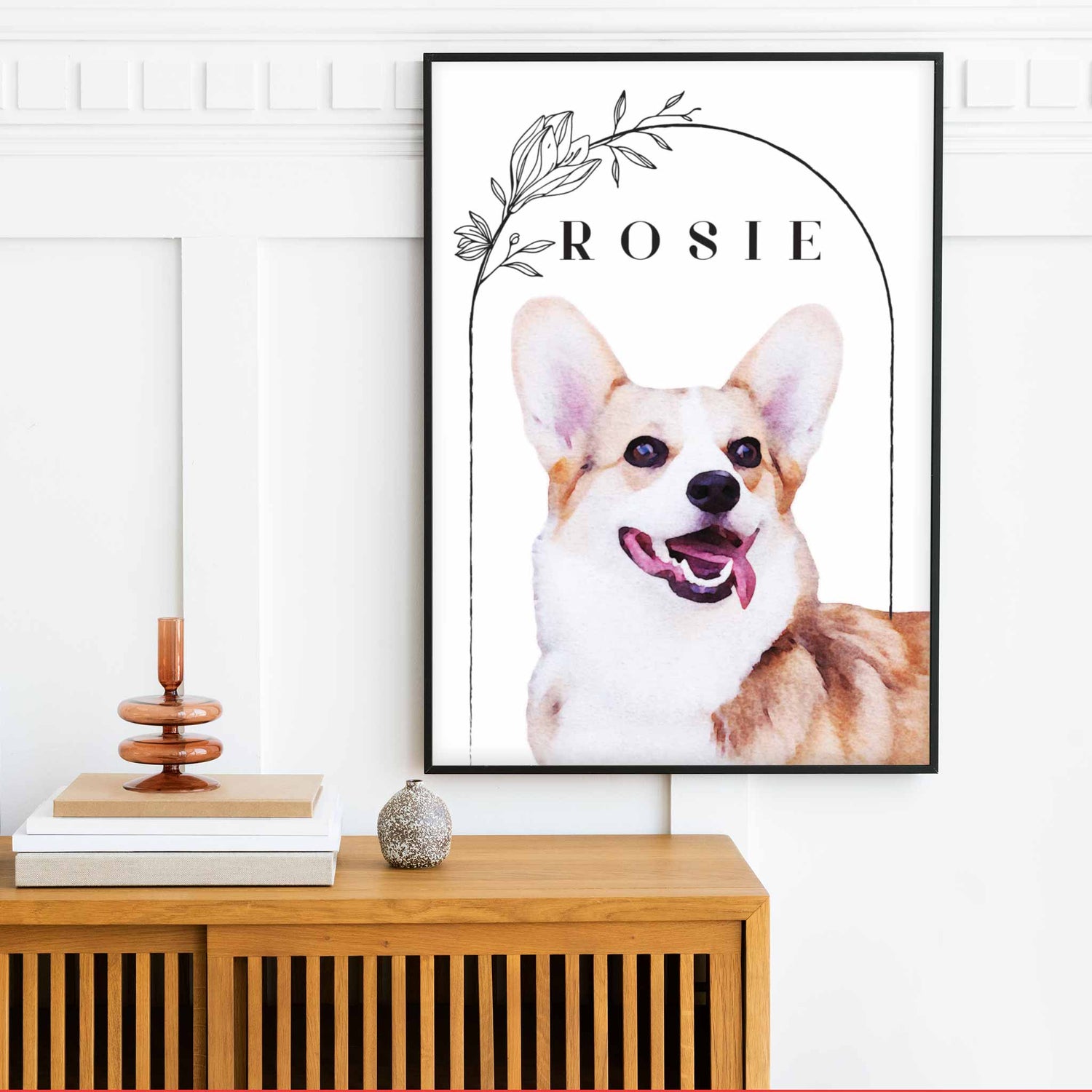 A black frame of a custom dog portrait decorated in a living room