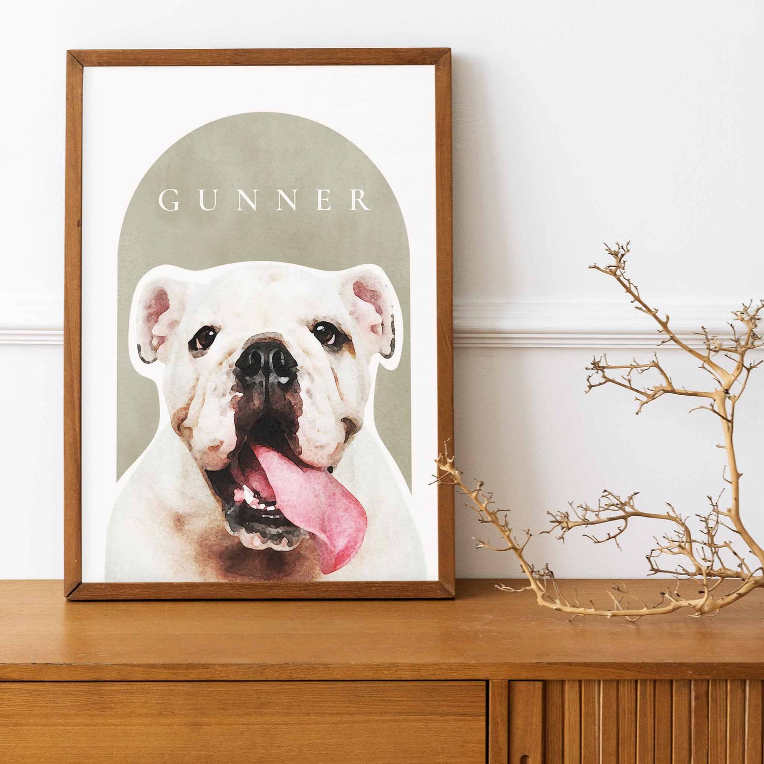 A wooden frame of a custom dog portrait decorated in a living room