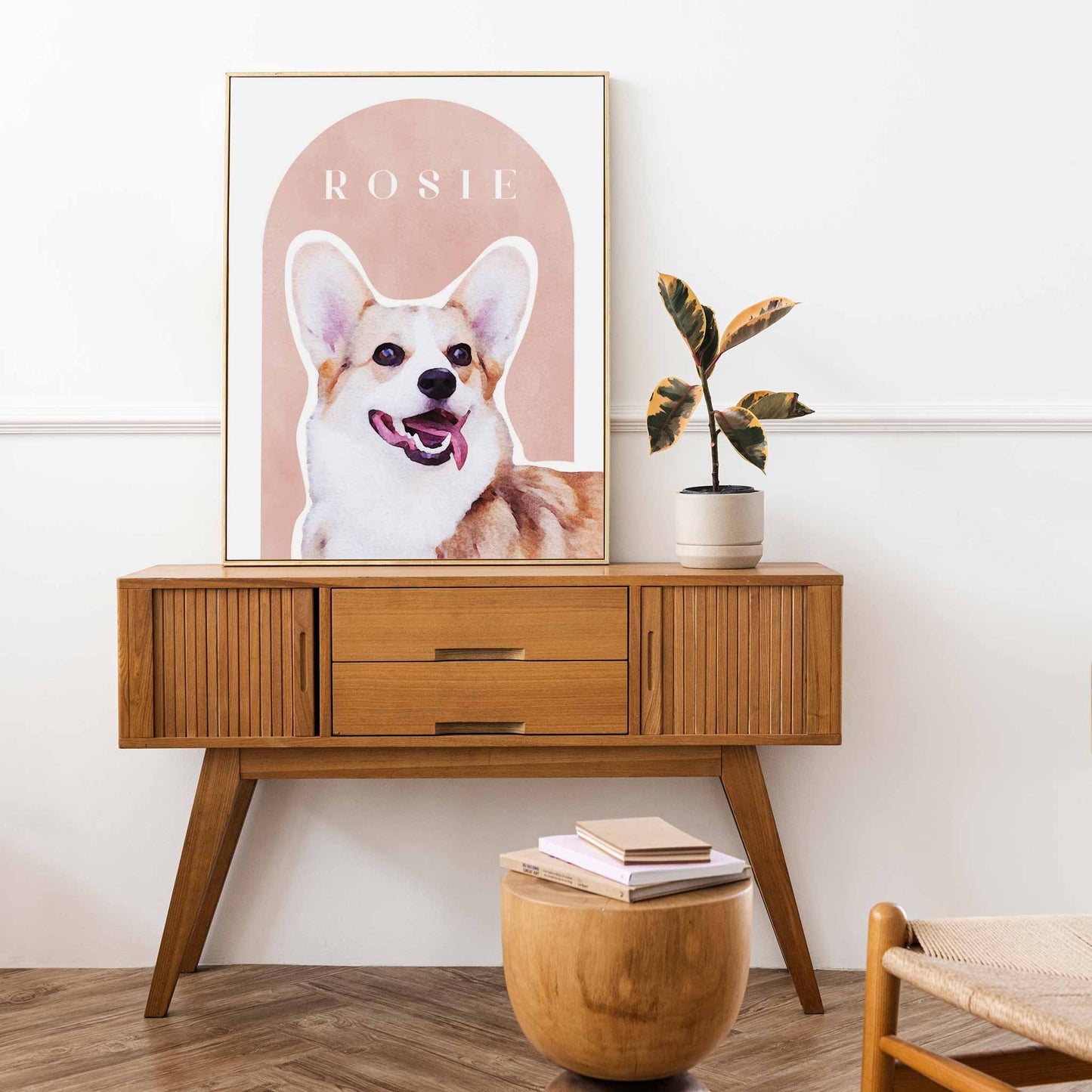 A golden frame of a custom dog portrait decorated in a living room