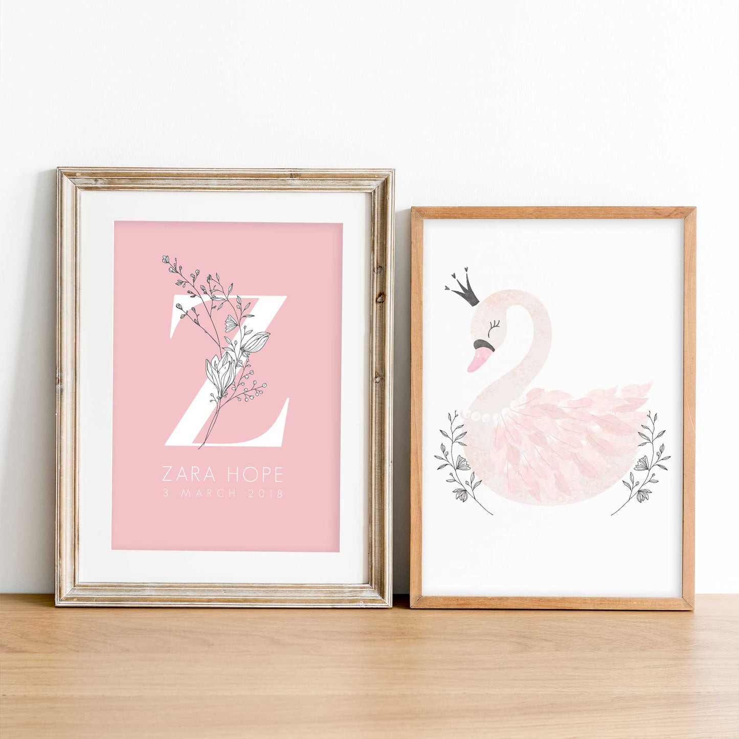 A set of 2 oak picture frames of a beautiful pink princess swan and floral monogram personalised nursery birth print 