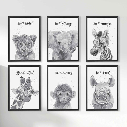 A set of six black picture frames of monochromatic safari animals aspirational print