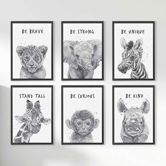 A set of six black picture frames of monochromatic safari animals aspirational print