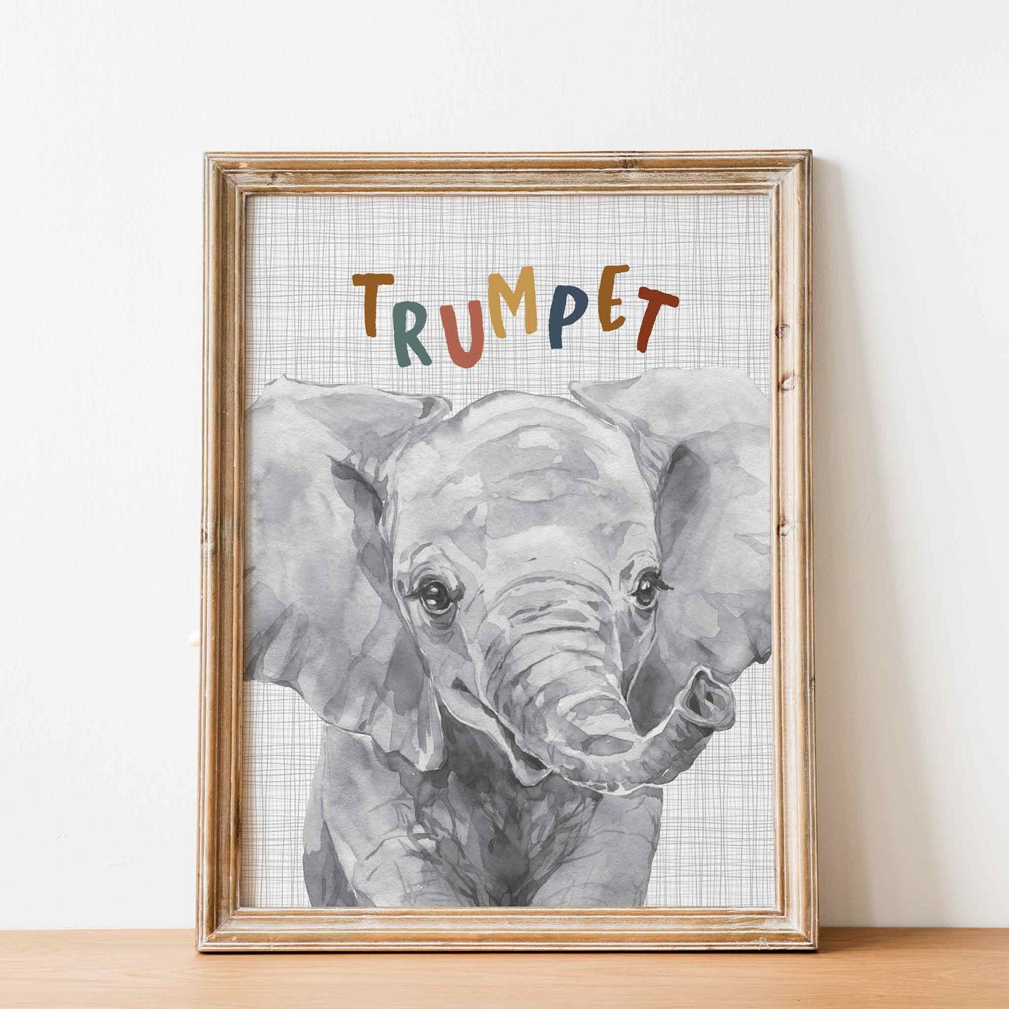 An oak picture frame of a cute watercolour baby elephant