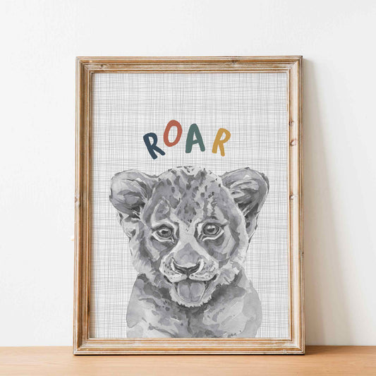 An oak picture frame of a cute watercolour baby lion cub