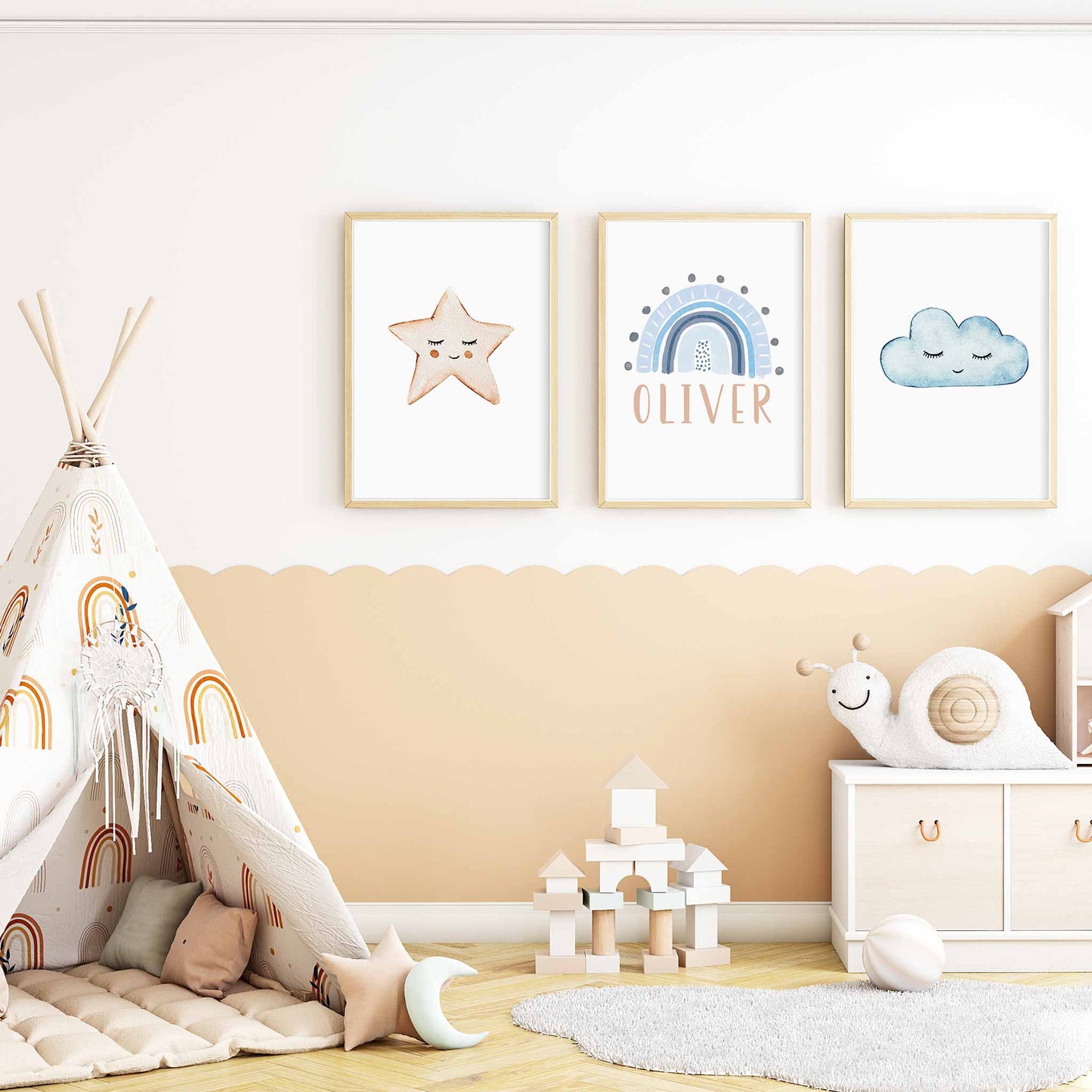 A set of 3 framed oak frames displaying a star, rainbow and cloud boy's name print decorated in the nursery