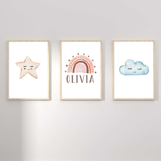 A set of 3 framed oak frames displaying a star, rainbow and cloud girl's name print