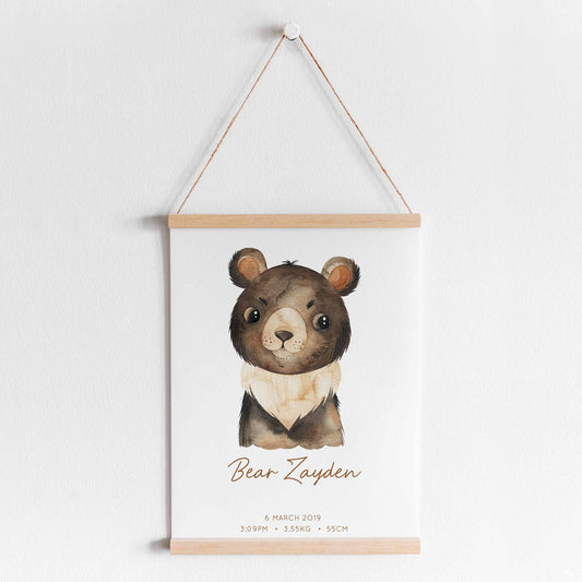 A hanging frame of a watercolour bear kids personalised birth print