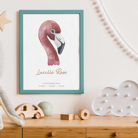 Framed picture of a watercolour flamingo kids personalised birth print in a child's nursery