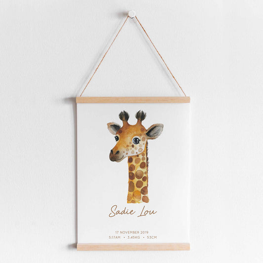 A hanging frame of a watercolour giraffe kids personalised birth print