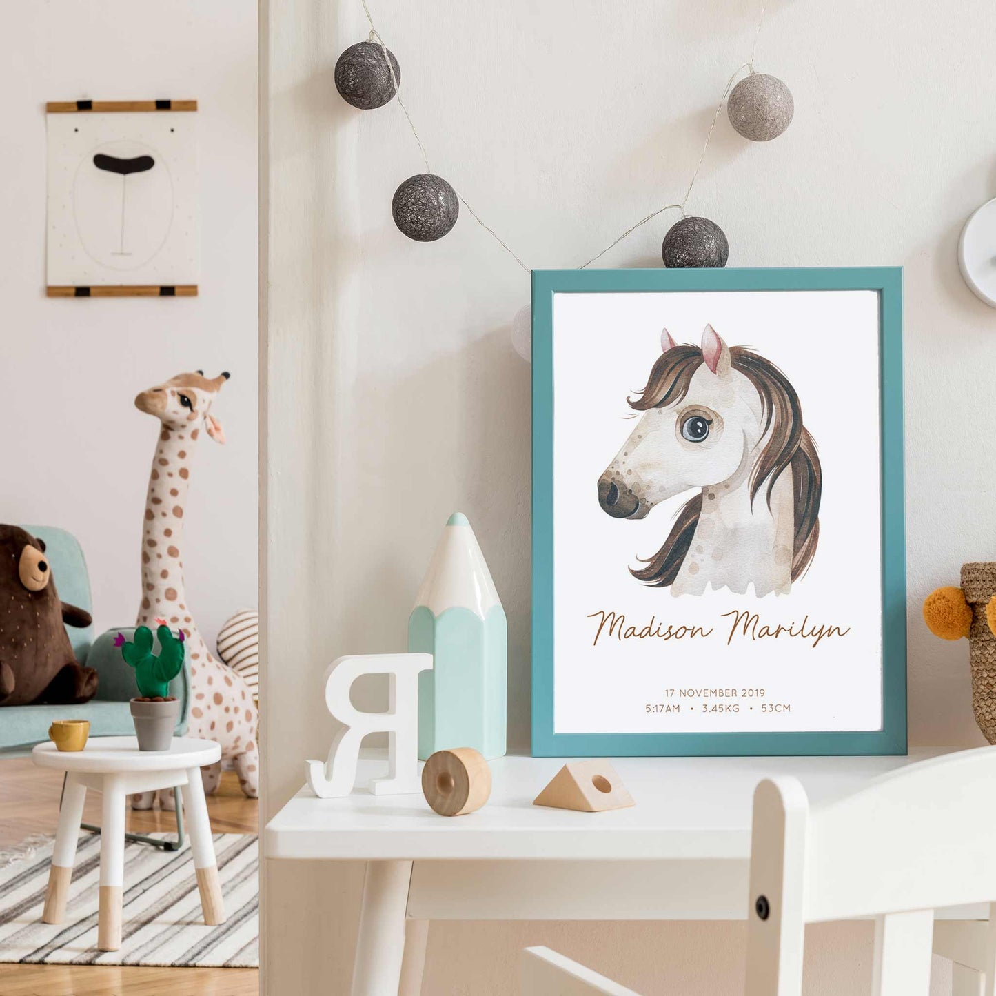 Framed picture of a watercolour horse kids personalised birth print in a child's nursery