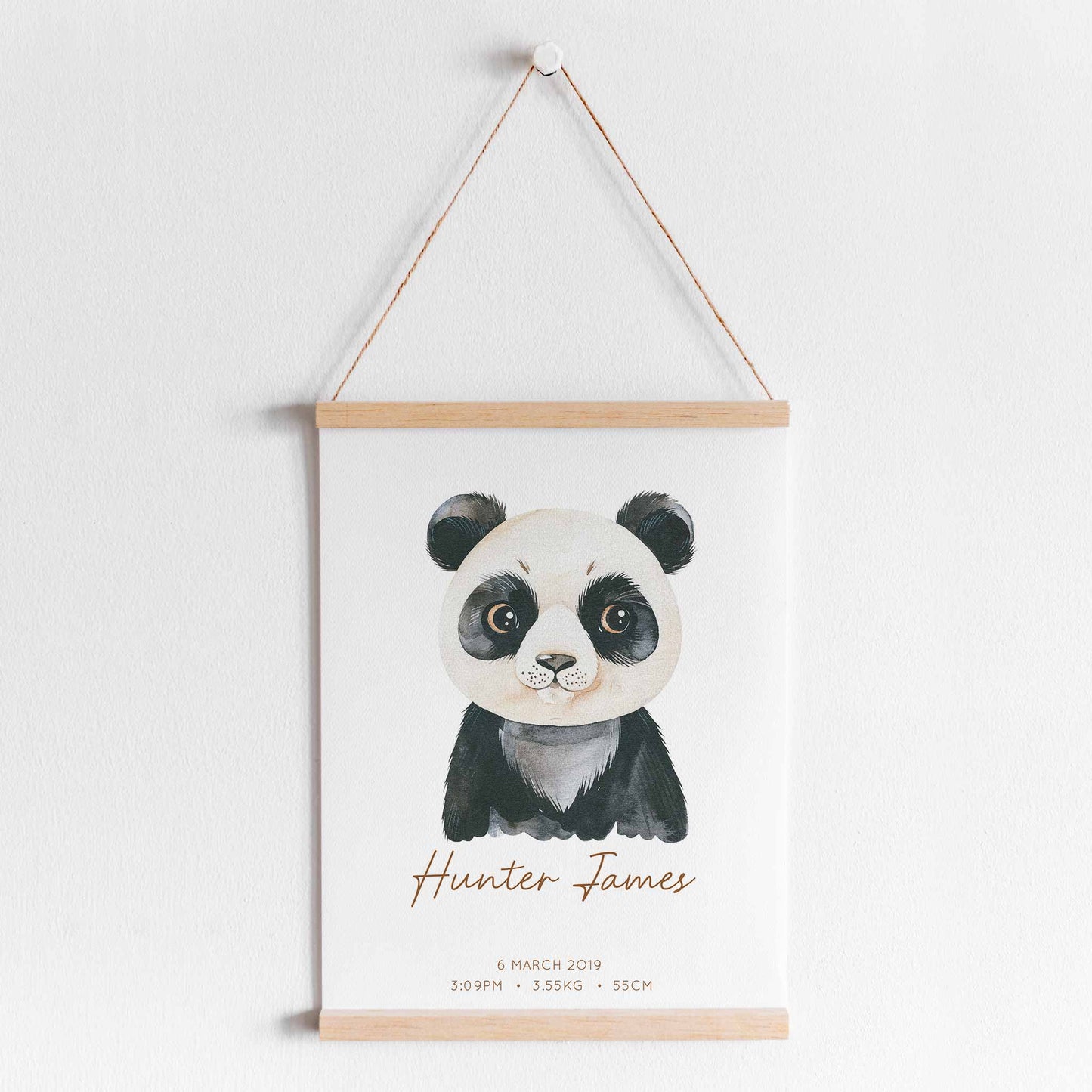 A hanging frame of a watercolour panda kids personalised birth print