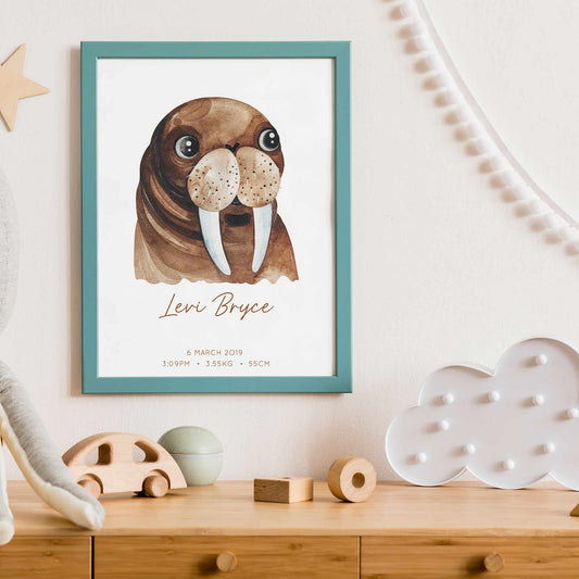 Framed picture of a watercolour walrus kids personalised birth print in a child's nursery