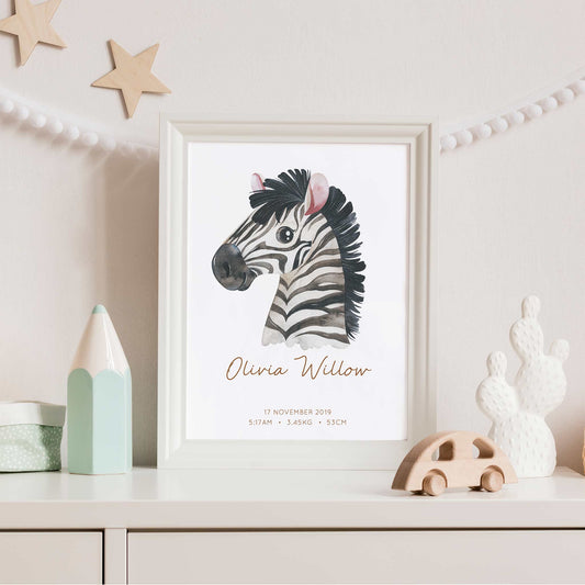 Framed picture of a watercolour zebra kids personalised birth print in a child's nursery