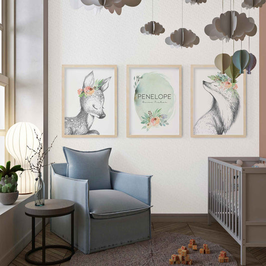 A set of 3 framed images of woodland deer and fox sketch floral nursery personalised birth print decorated in a nursery Edit alt text