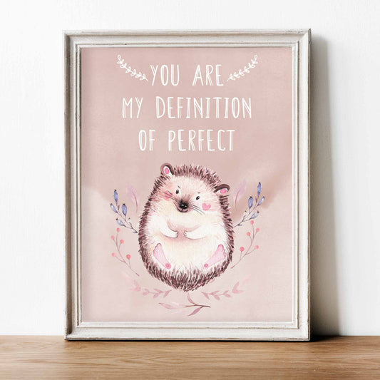 An white frame of a cute woodland hedgehog with inspirational quoteAn white frame of a cute woodland hedgehog with inspirational quote