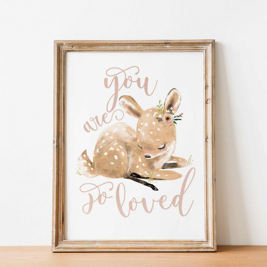 An oak frame of a cute whimsical deer with inspirational quote